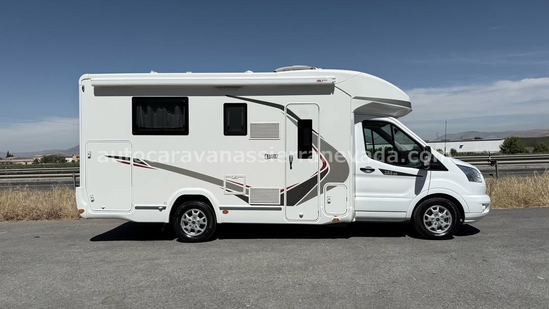 Perfilada CHALLENGER 288EB QUARTZ

Autocaravanas Sierra Nevada empresa con más de 20 años de experiencia en el sector de venta de ocasión os ofrece esta magnífica casa rodante.🗣️👉 Para más información o precio 💵 consulté en nuestra página web

www.autocaravanassierranevada.com

➡️🌐💻 o haga click👉🖱️ en nuestro enlace ⬇️👇

https://autocaravanassierranevada.com/listings/challenger-288eb-quartz/

¿Quieres pagar a plazos?
Llama y te informamos sin compromiso

📞617795719
📞621251555

Extras 👇

MOTOR: Ford 2.0 TDCI 170cv
AÑO: 2017
KM: 27.000
Medidas: 6,80m x 3,10m
Plazas viajar: 4
Plazas dormir: 4
* Medida Garaje con doble portón: (2,15m x 0,90m x 1,20m)
* Camas (Isla elevable / Colgante eléctrica)
* Cadena de distribución
* Suspensión Neumática
Extras:
Aire acondicionado (de motor)
AirBag(conductor y copiloto)
Velocidad de crucero
Cierre centralizado (en cabina)
Espejos eléctricos
Elevalunas eléctricos
Radio Original Ford (USB- BT -AUX)
Cámara de visión trasera
Asientos giratorios
Mosquiteras en ventanas, claraboyas y puerta principal
Claraboyas transparentes y Claraboya panorámica en cabina
Frigo THETFORD (220v, Gas, 12v, Auto) 175L capacidad
Ducha con mampara separada de aseo
Batería de 95ah.
Placa solar de 80w.
Calefacción TRUMA combi inetready a gasoil
Tv 12v. (TDT-HDMI-USB-DVD)
Escalón de doble peldaño integrado
Toldo FIAMMA de 3,5m.
Neumáticos reforzados marca MICHELIN especial camper

#autocaravanastyle #viajarconniños #viajarenautocaravanaconniños #roadtrip #autocaravanaadventure #ventadeautocaravanas #autocaravanassierranevada #autocaravantravel #autocaravanaenlaplaya #kitcamping #differentholidays #camaisla #motorhome #caravanas1000 #camper #motorhome