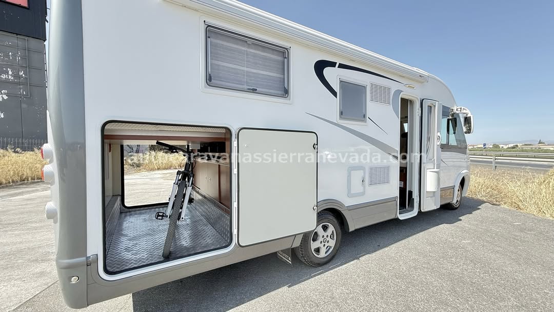 Integral MOBILVETTA K-YACHT MH89

Autocaravanas Sierra Nevada empresa con más de 20 años de experiencia en el sector de venta de ocasión os ofrece esta magnífica casa rodante.🗣️👉 Para más información o precio 💵 consulté en nuestra página web

www.autocaravanassierranevada.com

➡️🌐💻 o haga click👉🖱️ en nuestro enlace ⬇️👇

https://autocaravanassierranevada.com/listings/mobilvetta-k-yacht-mh89/

¿Quieres pagar a plazos?
Llama y te informamos sin compromiso

📞617795719
📞621251555

Extras 👇

MOTOR: Fiat Ducato 2.3 MultiJet 150cv
AÑO: 2013
KM: 53.000
Medidas: 7,20m x 3,00m
Plazas viajar: 4
Plazas dormir: 4
* Medida Garaje con doble portón: (2,20m x 1,15m x 1,25m)
* Camas (Isla elevable eléctrica / Colgante en cabina)

Extras:
Aire acondicionado(de motor)
AirBag(conductor y copilo)
Velocidad de Crucero
Cierre centralizado(puerta de cabina)
Espejos electicos
Elevalunas eléctricos (Conductor)
Radio (CD-USB-AUX)
Cámara de visión trasera
Asientos giratorios
OscurecedoresREMIS en cabina completa
Parasoles enrollables manuales
Mosquiteras en ventanas, claraboyas y puerta principal
Claraboyas transparentes y Claraboya panorámica XXL en salón y cama trasera
Frigo DOMETIC (220v, Gas, 12v, Auto) 150L capacidad
Horno
Extractor de humos
Ducha con mampara separada de aseo
Batería de 100ah.
2 Placa solar de 100w.
Calefacción Truma Combi
Tv 12v.(LCD-HDMI-USB-DVD)
Escalón de doble peldaño integrado
Toldo FIAMMA de 4m.
Ducha exterior
Neumáticos reforzados marca MICHELIN especial camper

#autocaravanastyle #viajarconniños #viajarenautocaravanaconniños #roadtrip #autocaravanaadventure #ventadeautocaravanas #autocaravanassierranevada #autocaravantravel #autocaravanaenlaplaya #kitcamping #differentholidays #camaisla #motorhome #caravanas1000 #camper #motorhome